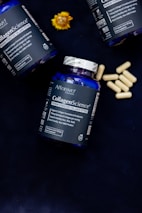 Three bottles of collagen - science sitting on a table