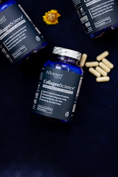 Three bottles of collagen - science sitting on a table