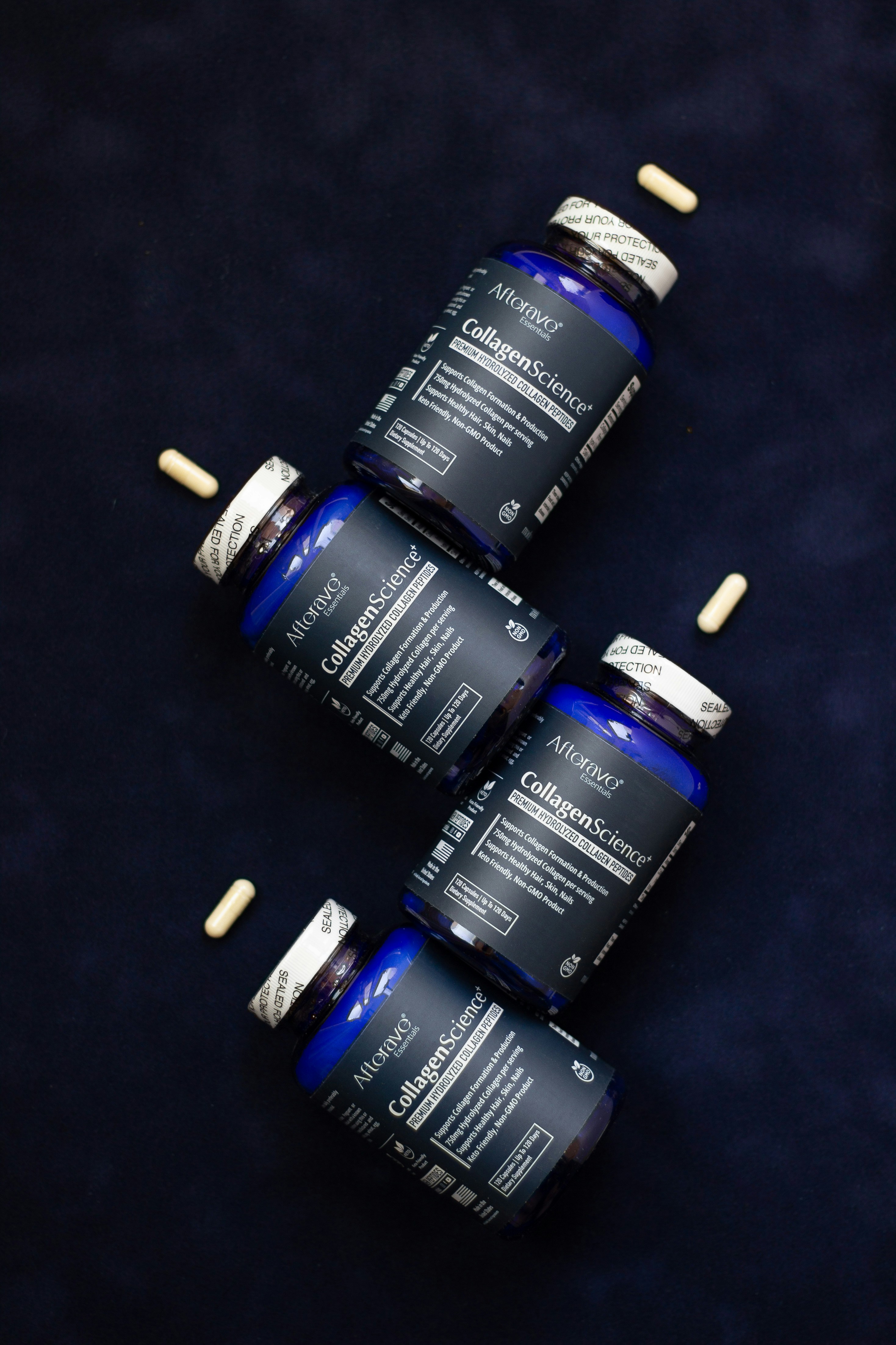 Three bottles of vitamins sitting next to each other