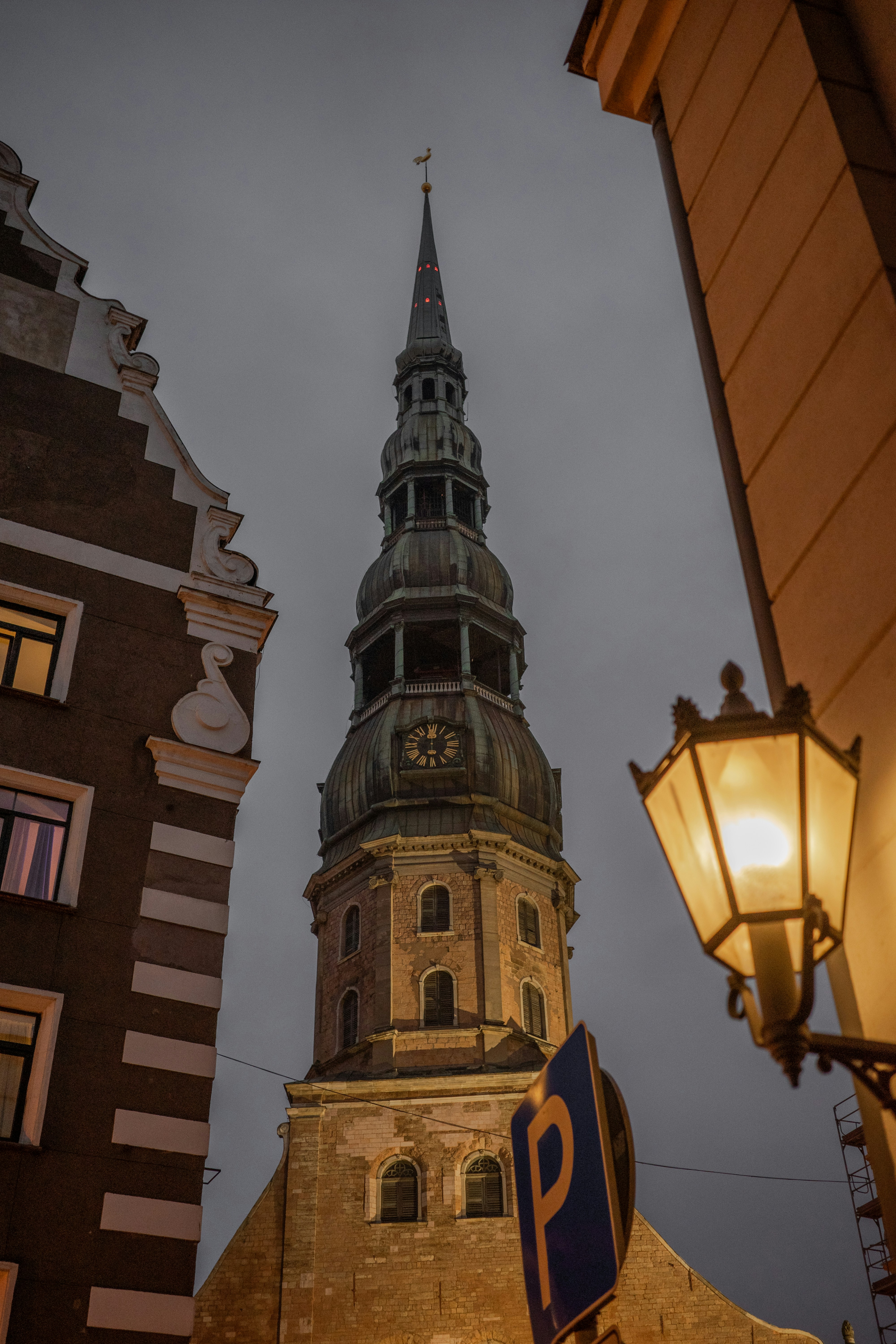 A tall tower with a clock on the top of it