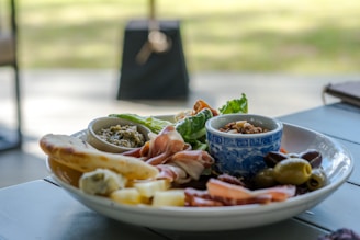 A plate of food sitting on a table