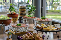 Catered buffet with prepared dishes arranged for service