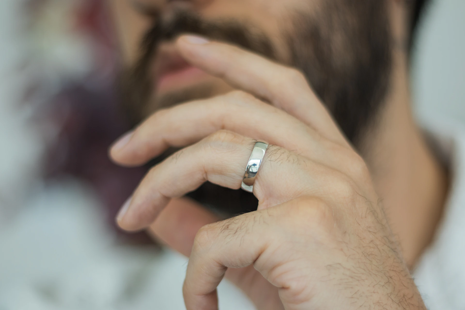 A man with a ring on his finger