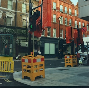 A traffic light sitting on the side of a road