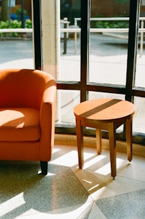 A chair and a table in a room