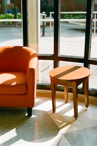 A chair and a table in a room
