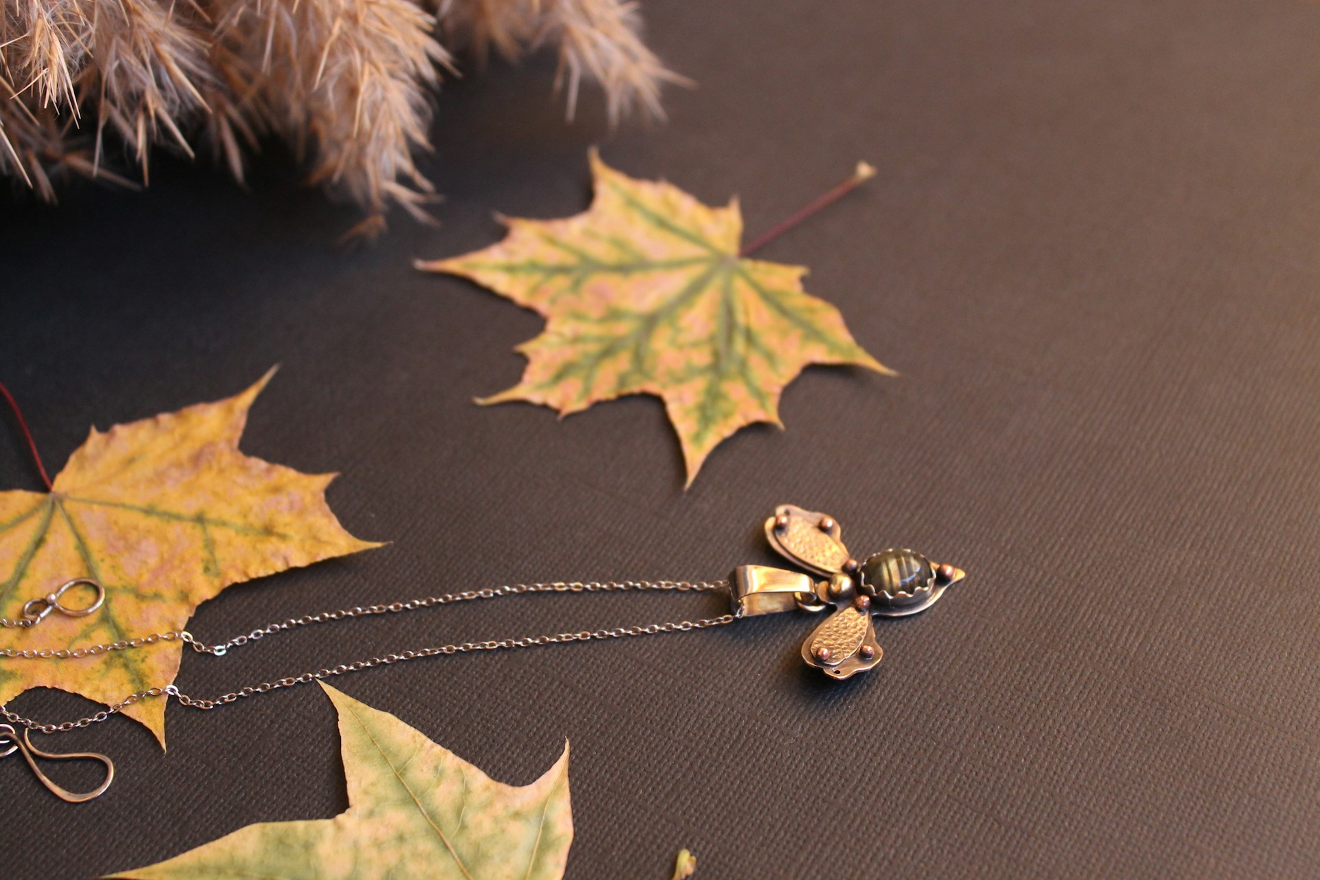 A group of autumn leaves on a table