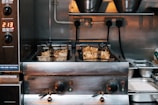 A commercial kitchen with a lot of food in it