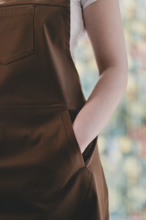 Apron with multiple pockets for egg collecting