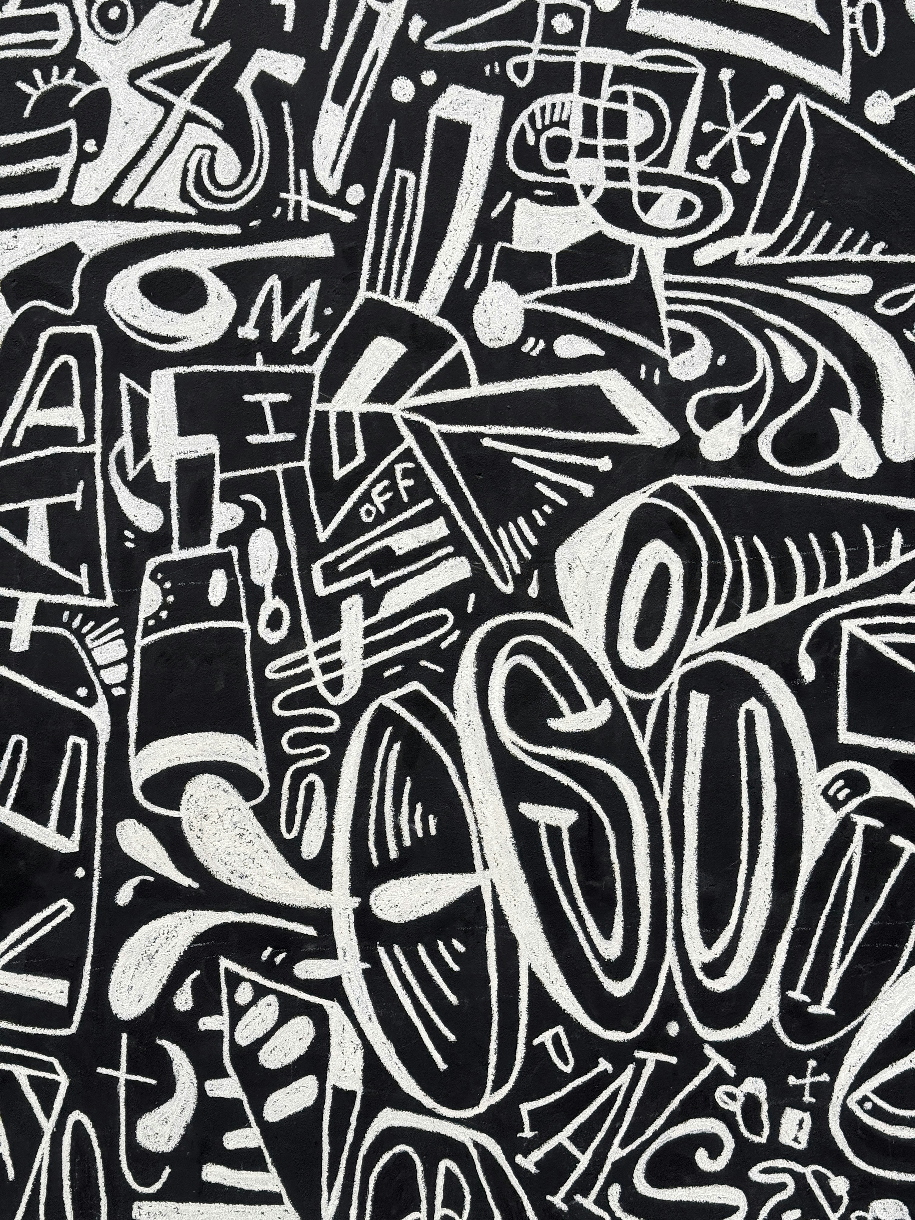 A black and white drawing of letters and numbers