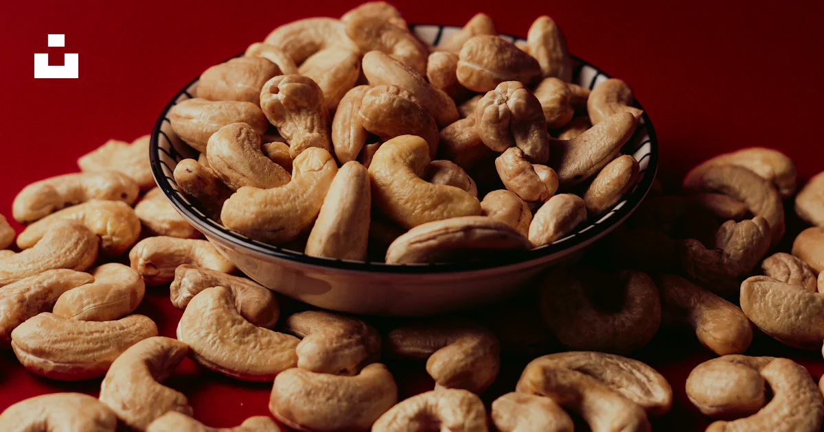 A bowl of nuts on a red background photo – Free Food Image on Unsplash