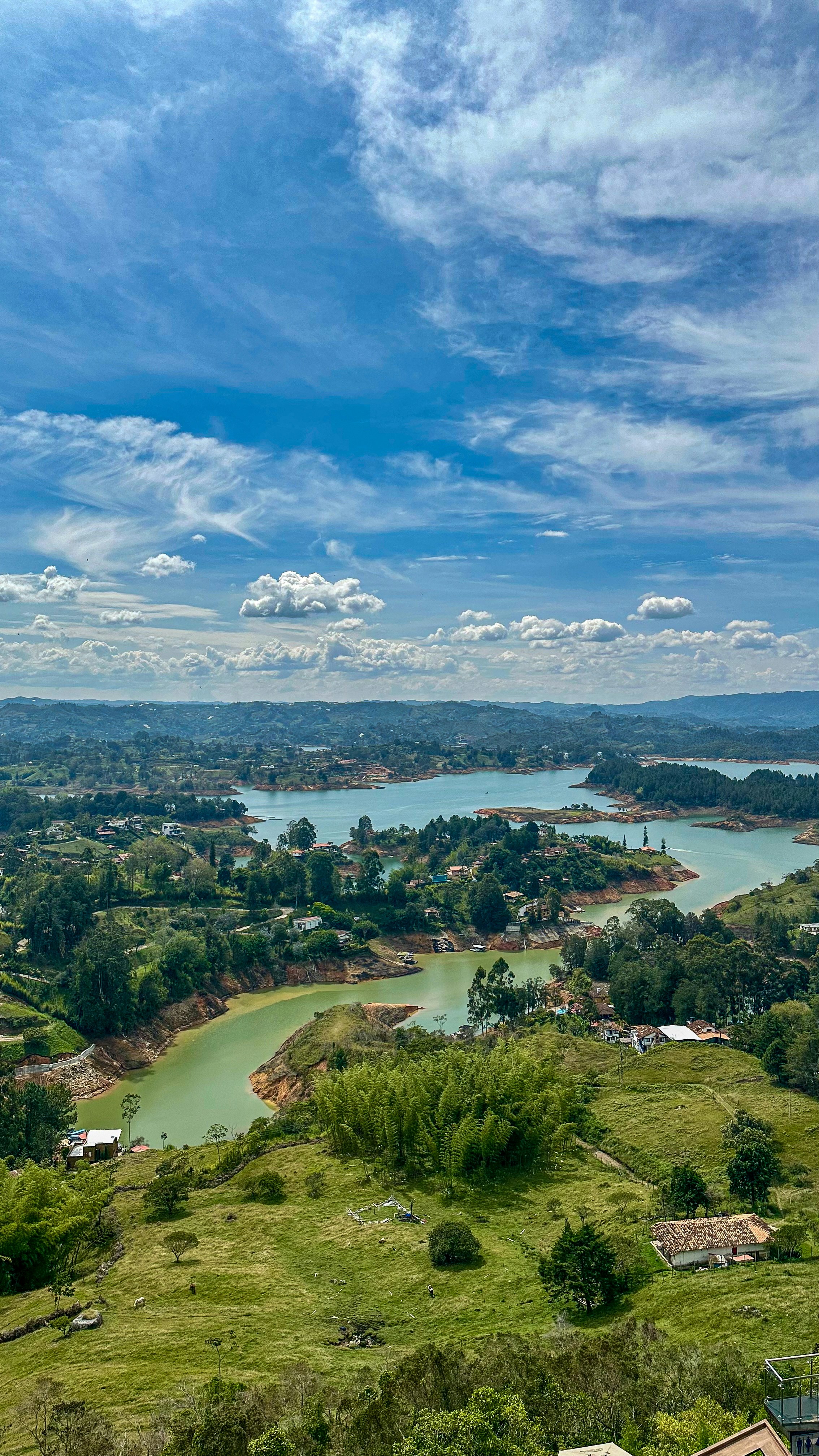 A scenic view of a lake and a town