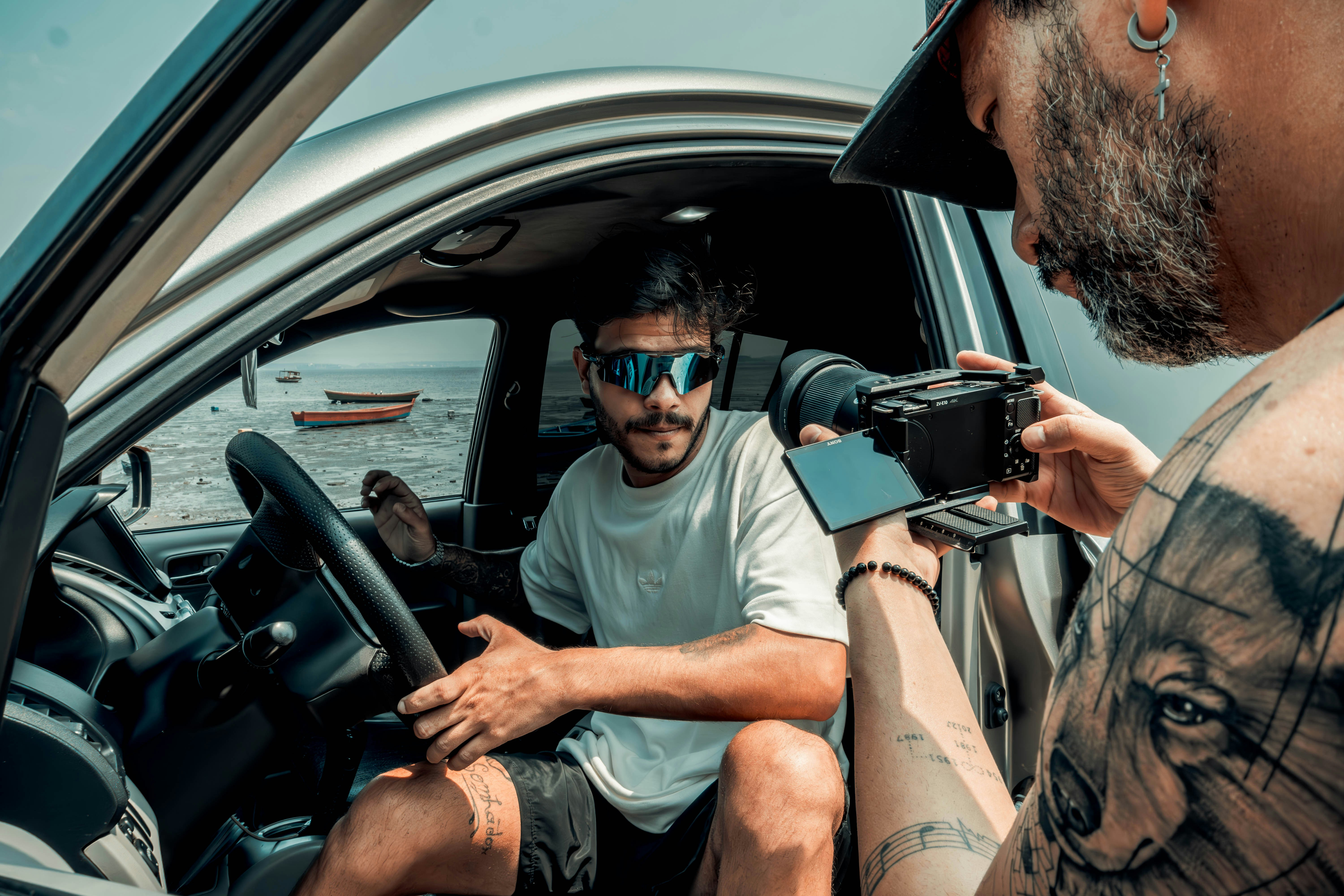 Camera team in a car