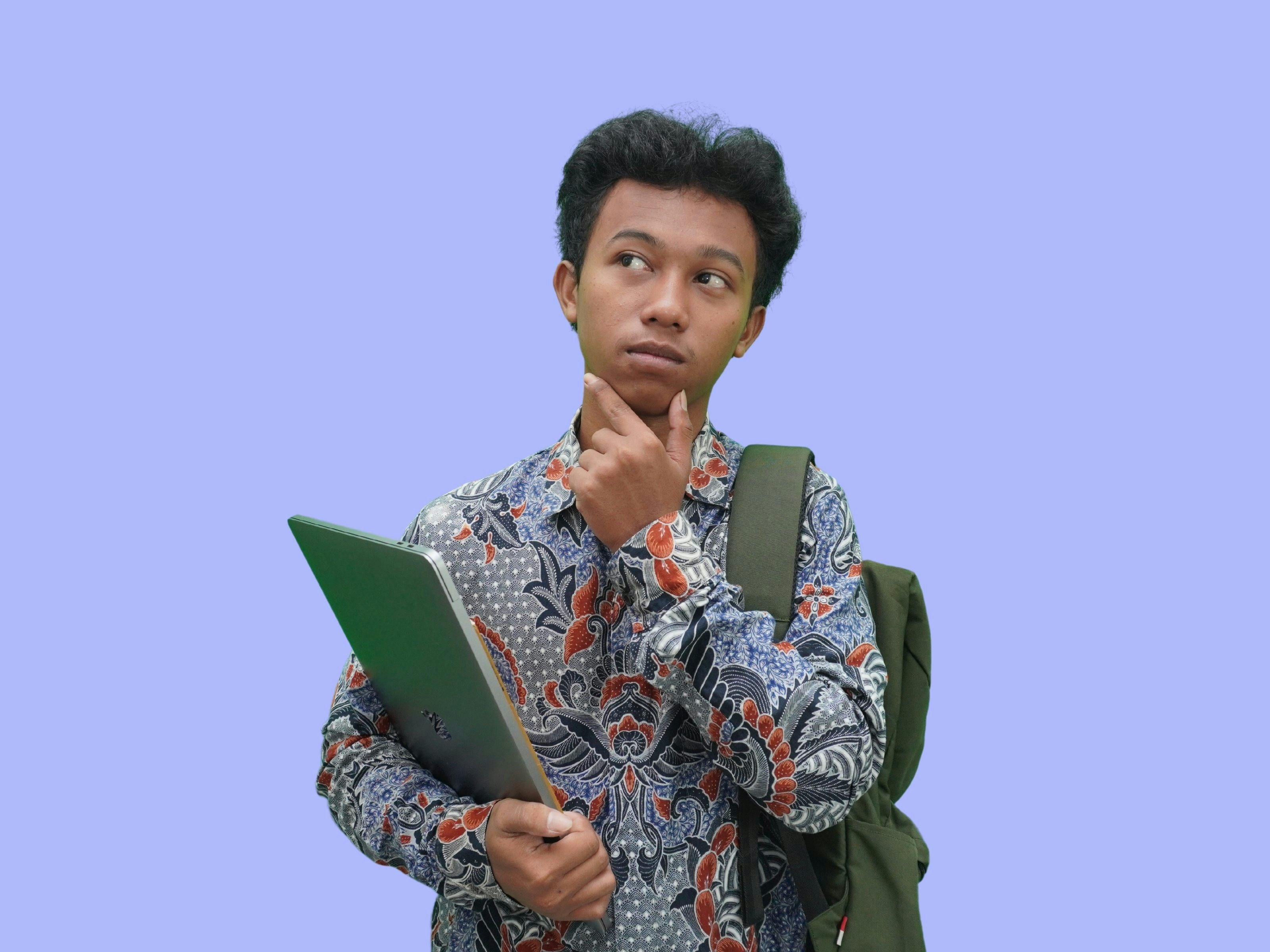 Indonesian College Students Wearing Batik Confused Thinking Pose