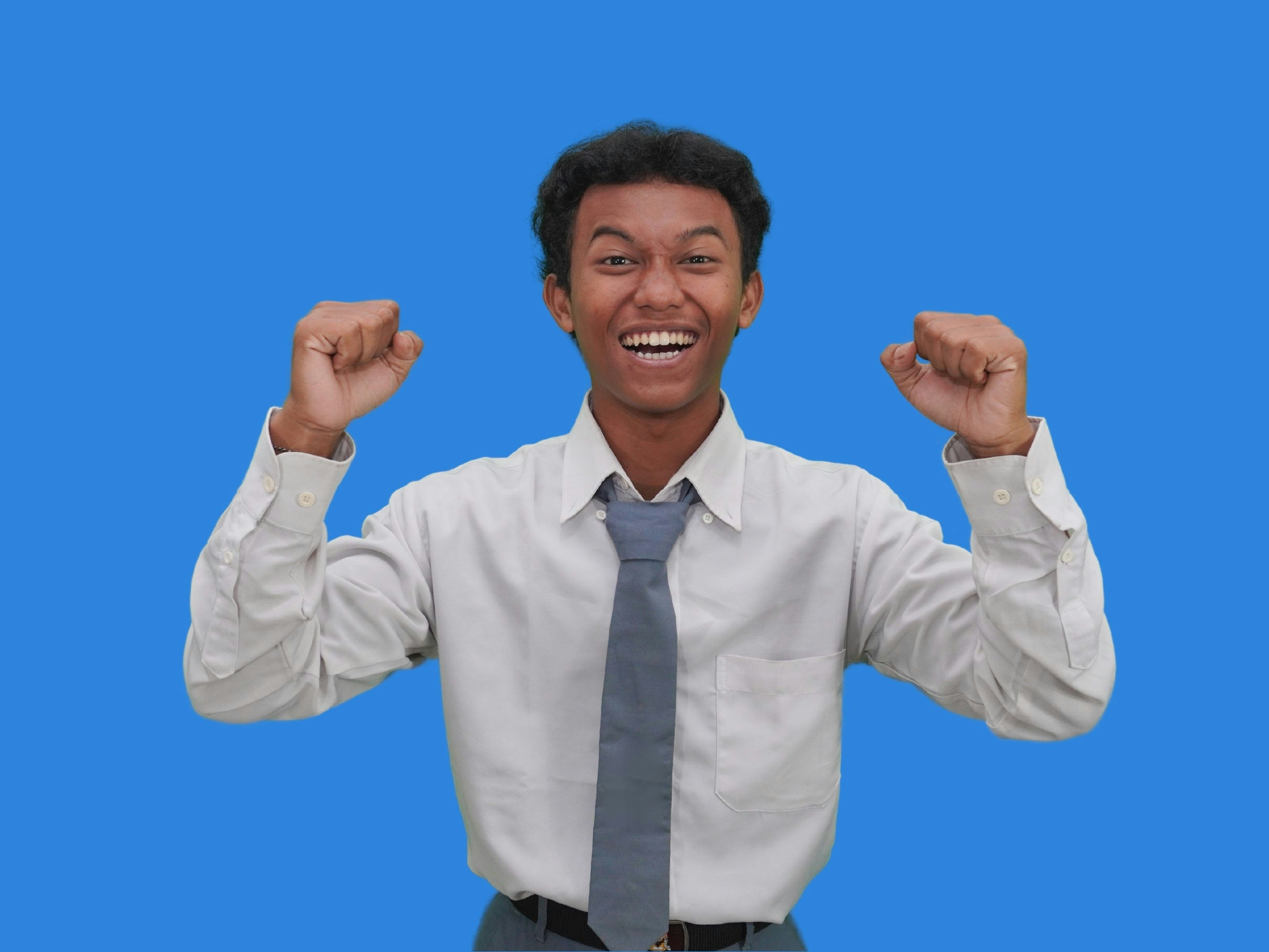 Teen students celebrating academic success