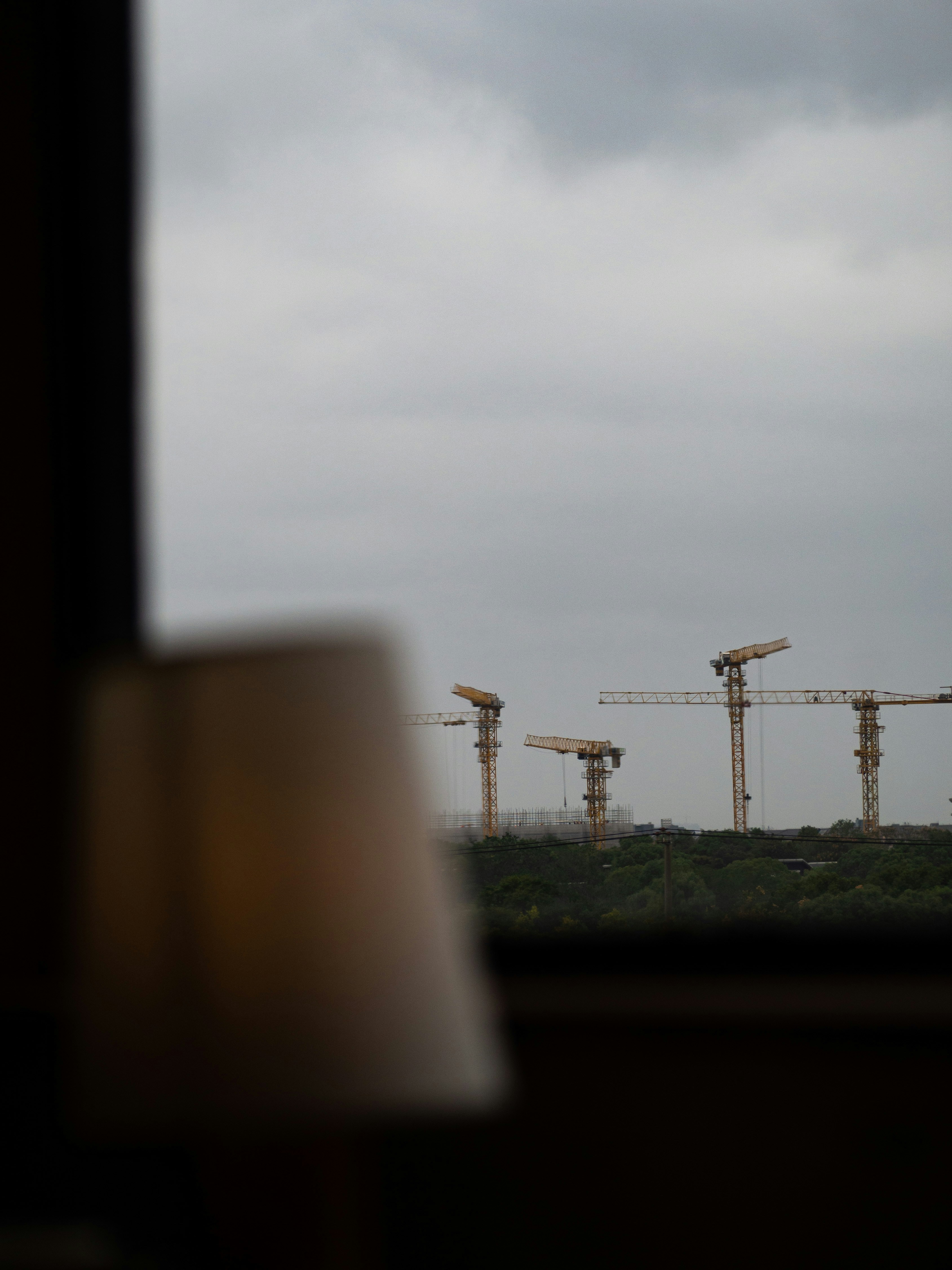 A view of a construction site from a window photo – Free Building Image ...