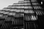 A black and white photo of a tall building
