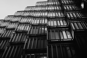 A black and white photo of a tall building