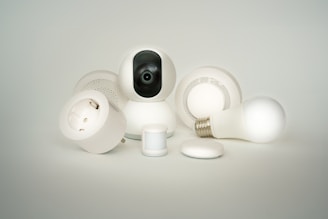A camera sitting on top of a pile of white objects