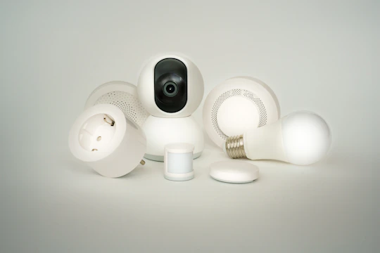 A camera sitting on top of a pile of white objects