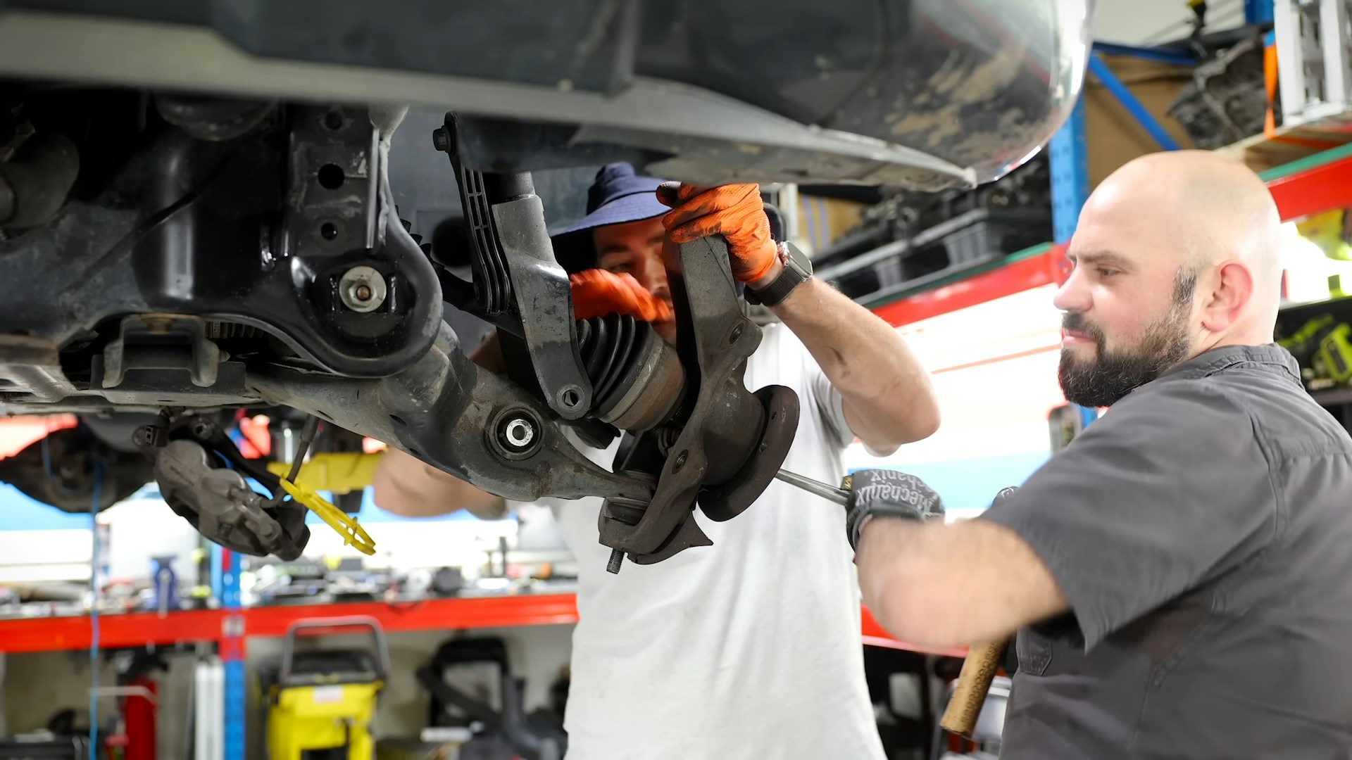 A man working on a car in a garage