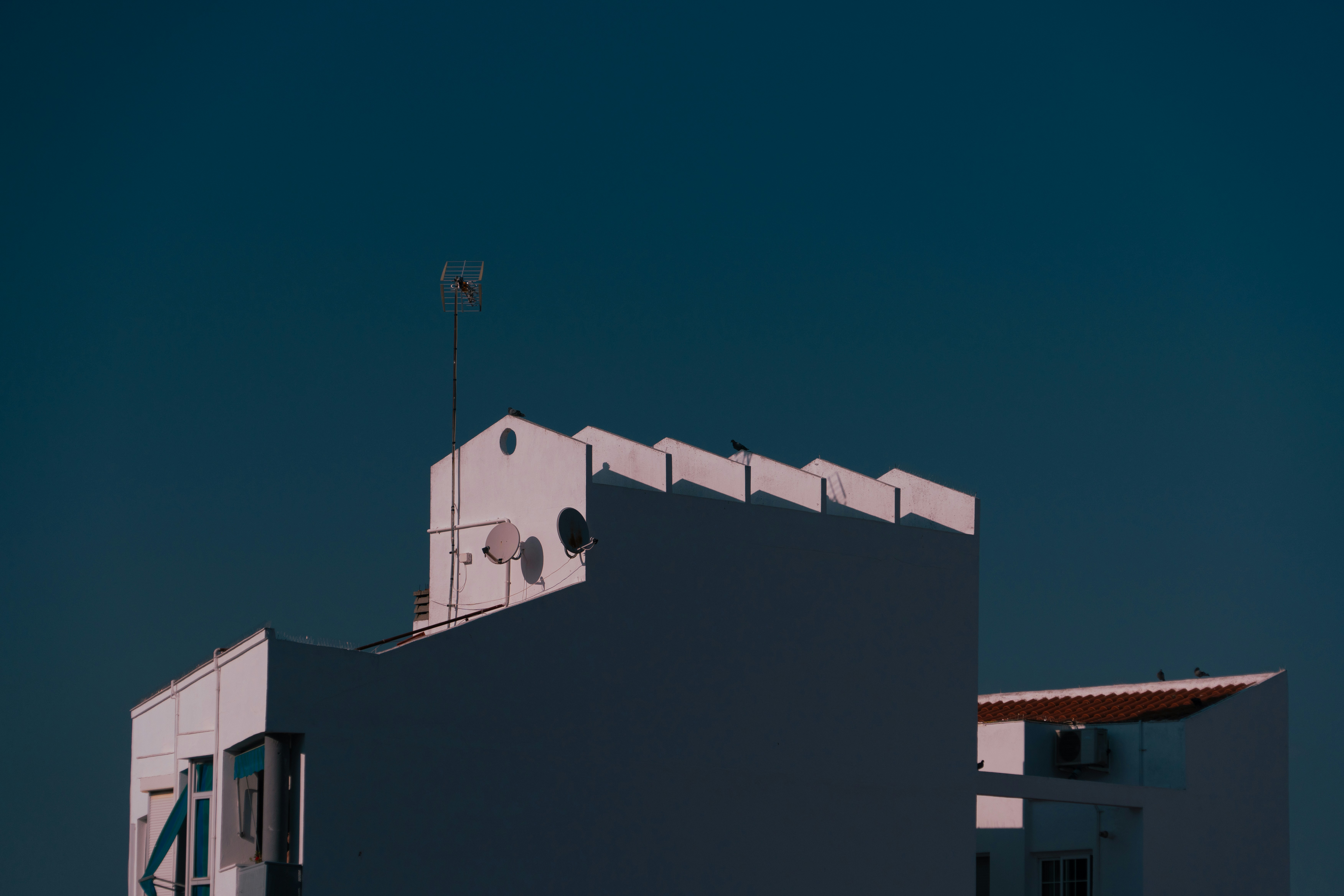 A building with a clock on the top of it