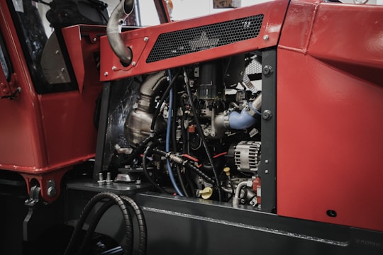 A close up of a red truck engine