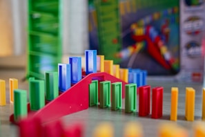 A close up of a game of dominos on a table