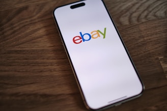 A close up of a cell phone on a table