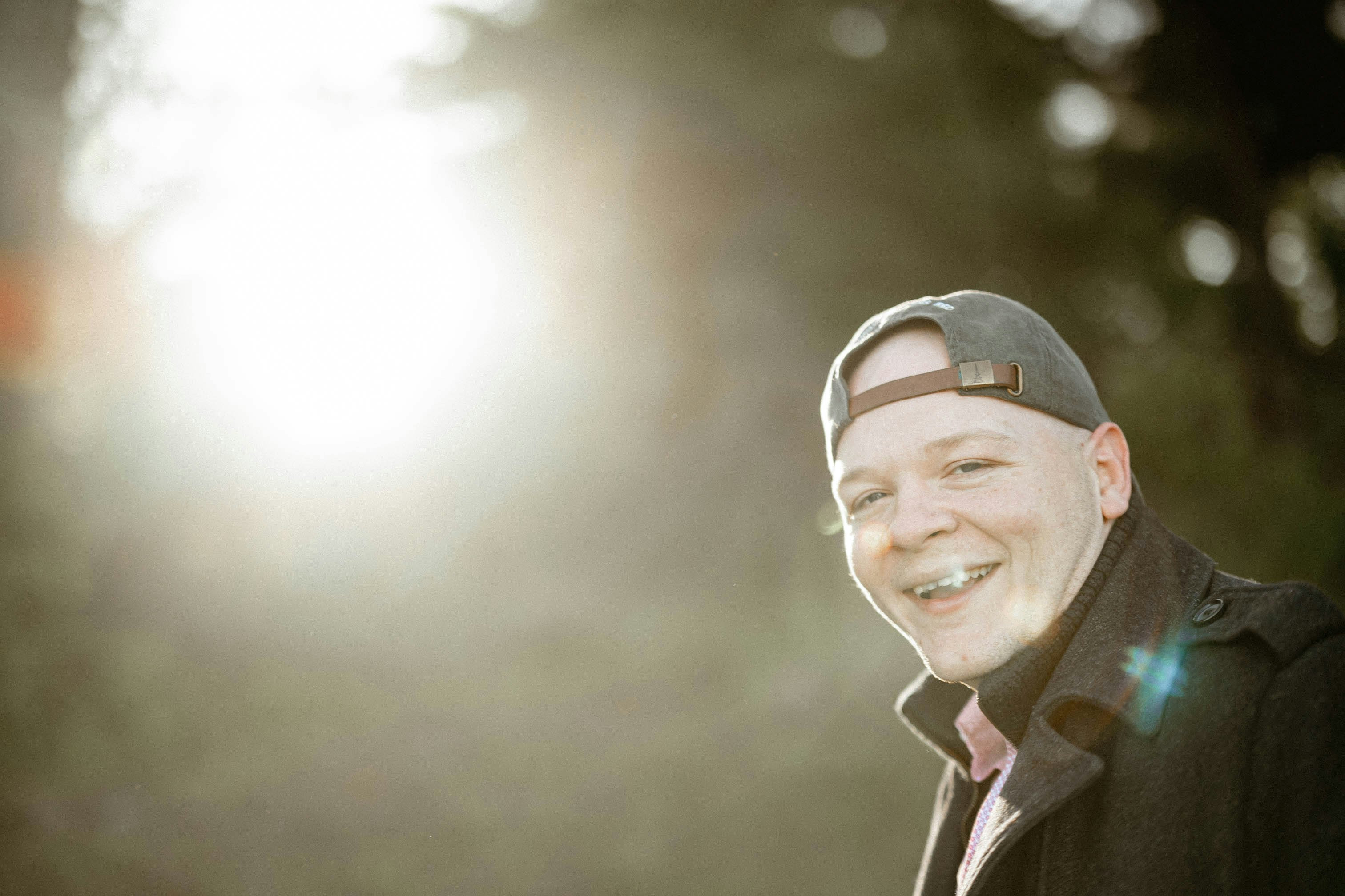 Person smiling outdoors
