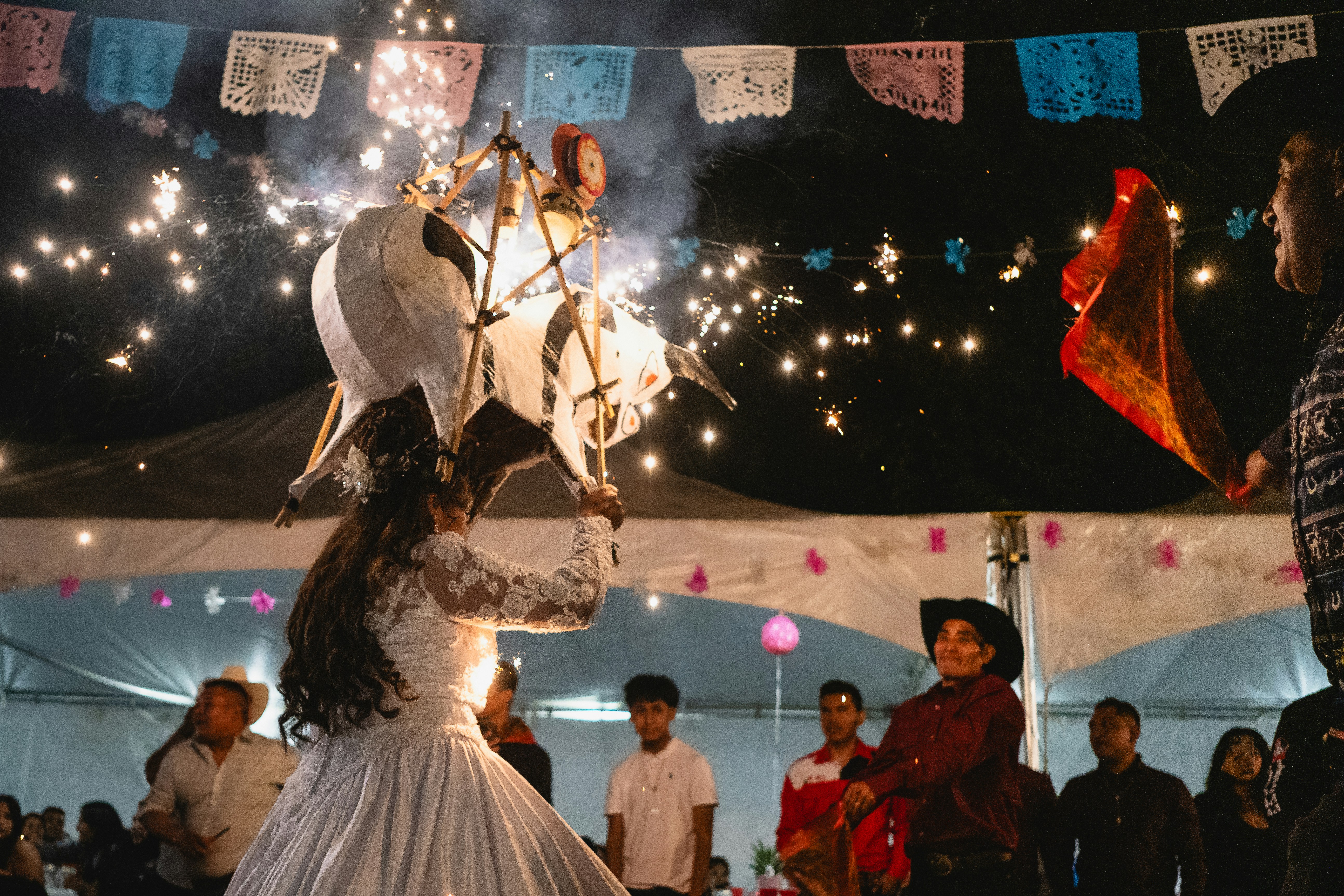 A couple of people that are standing in the dirt