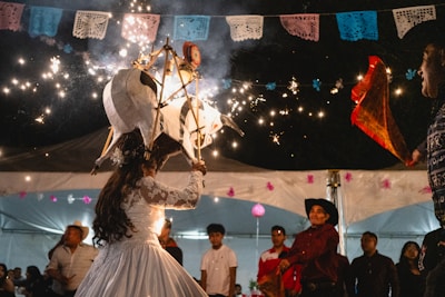 A couple of people that are standing in the dirt