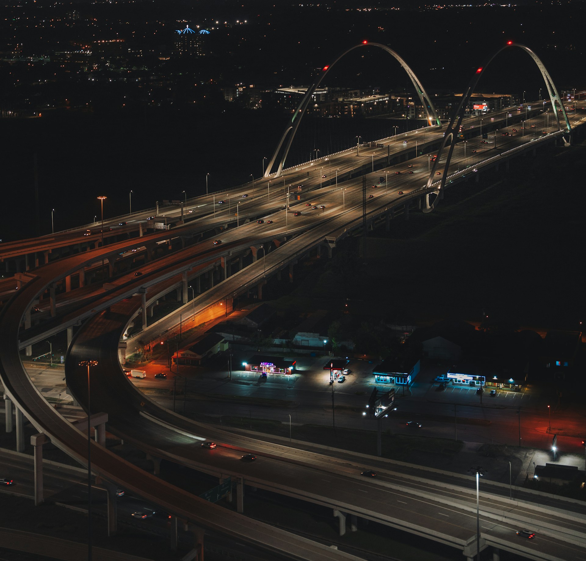 An aerial view of a freeway at night