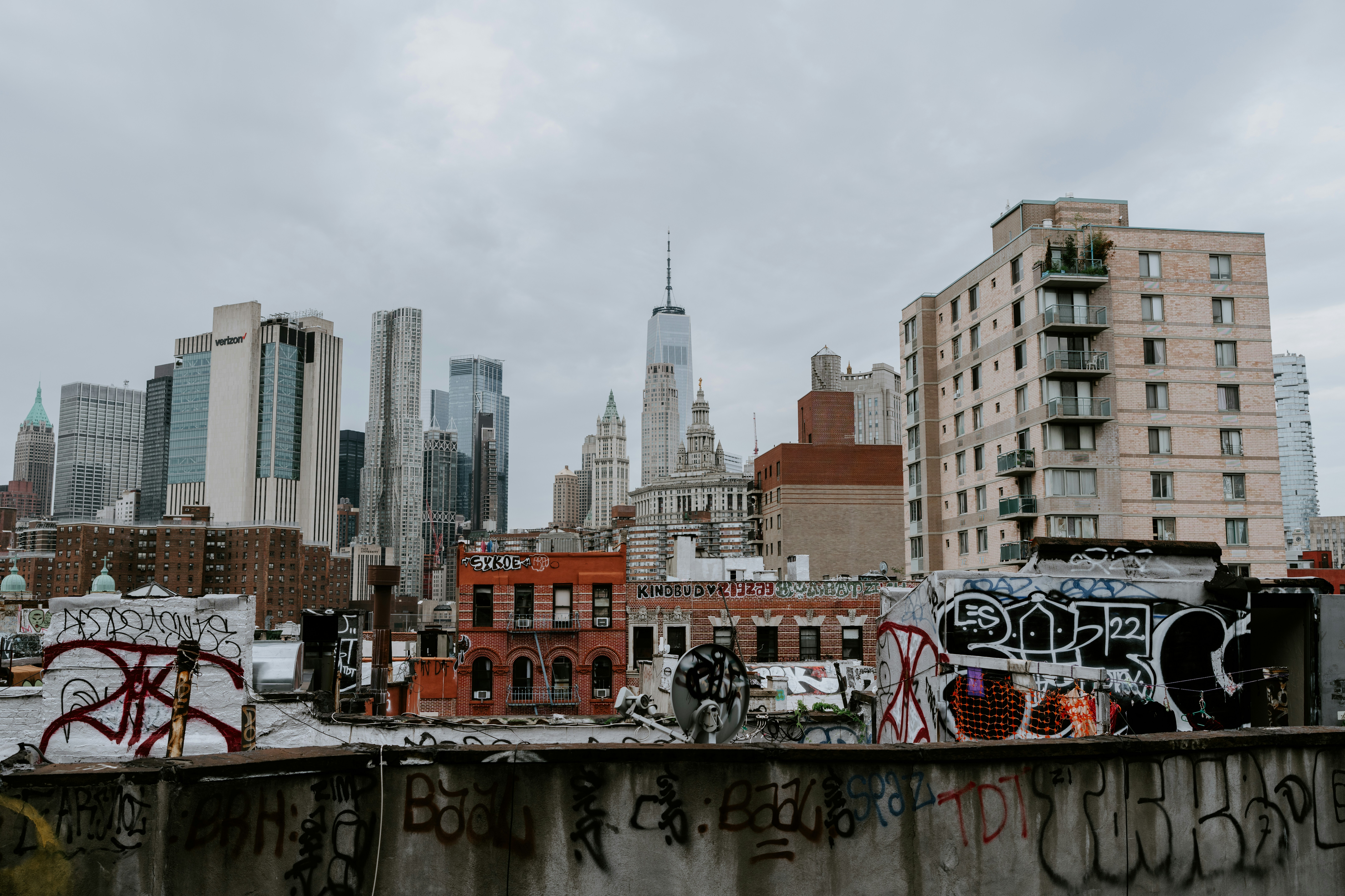 A view of a city with graffiti on it