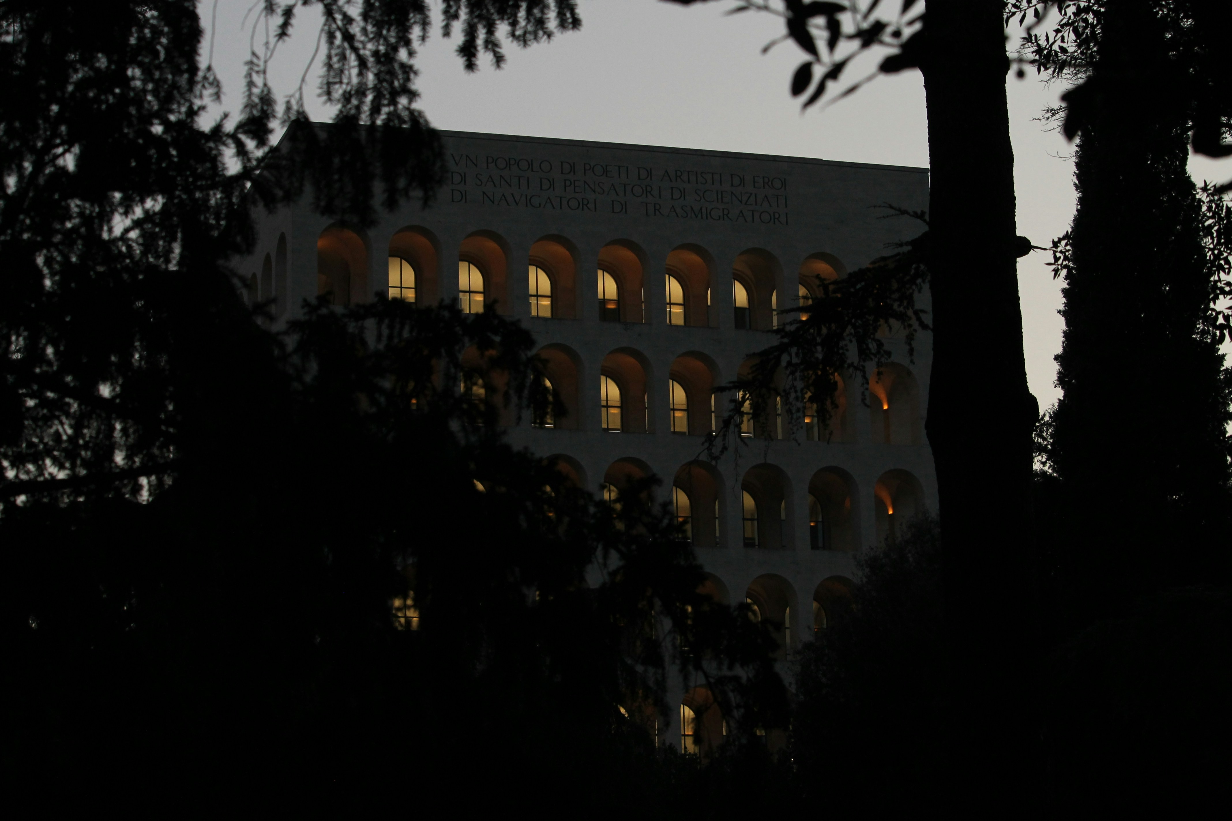 A large building is lit up at night