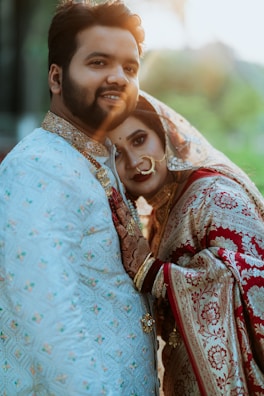A man and a woman dressed in traditional indian garb