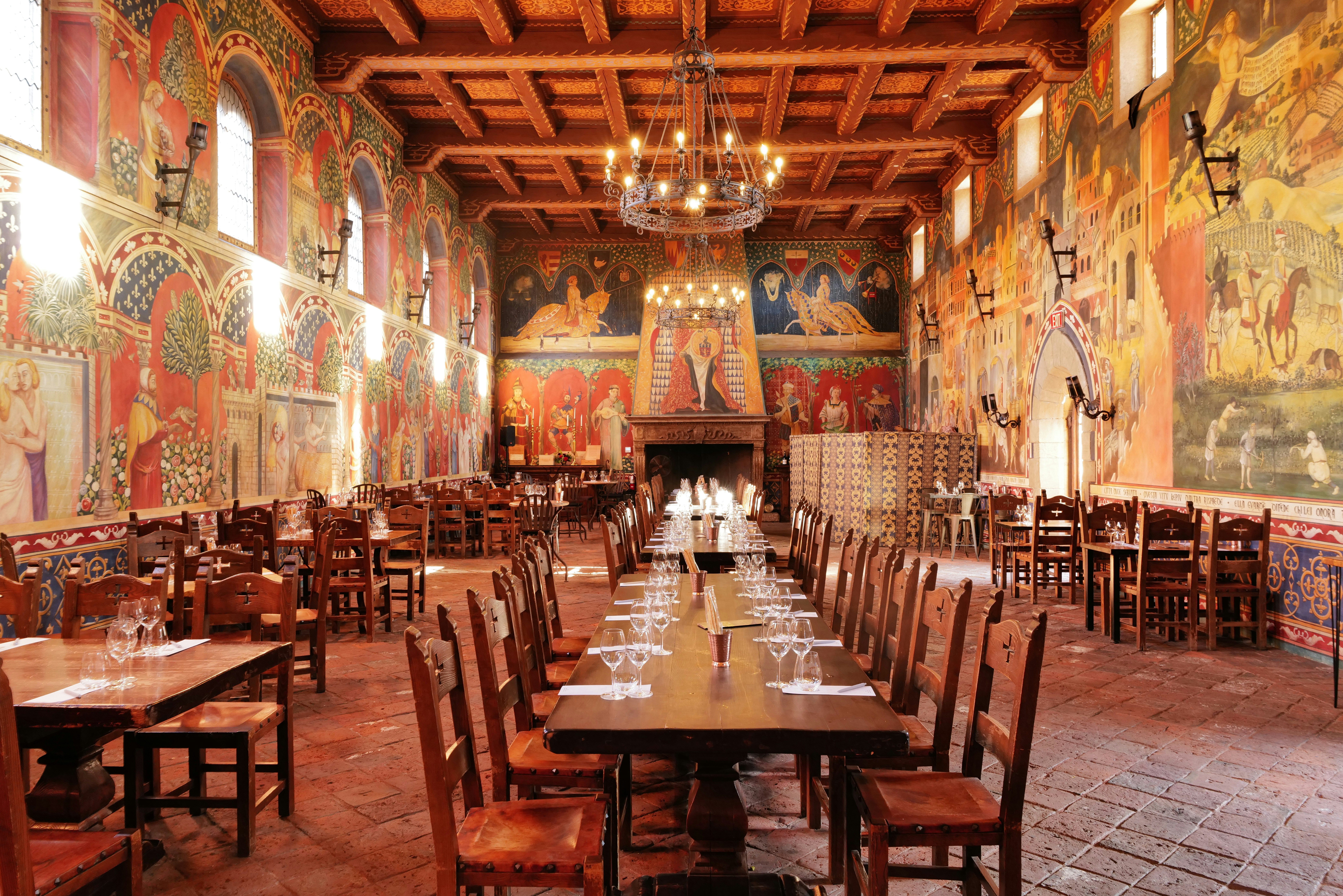 A large dining room with many tables and chairs