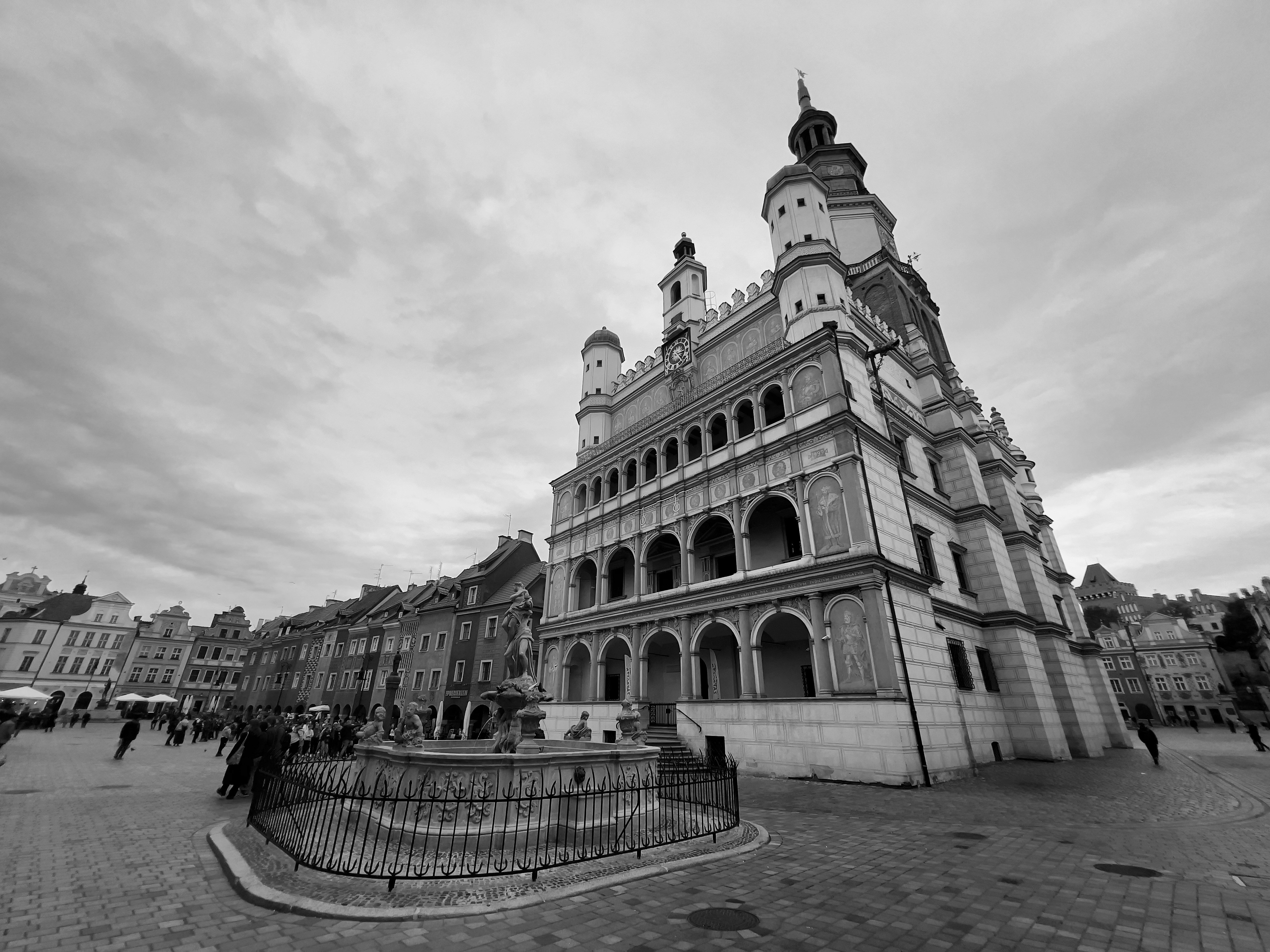 A black and white photo of a clock tower