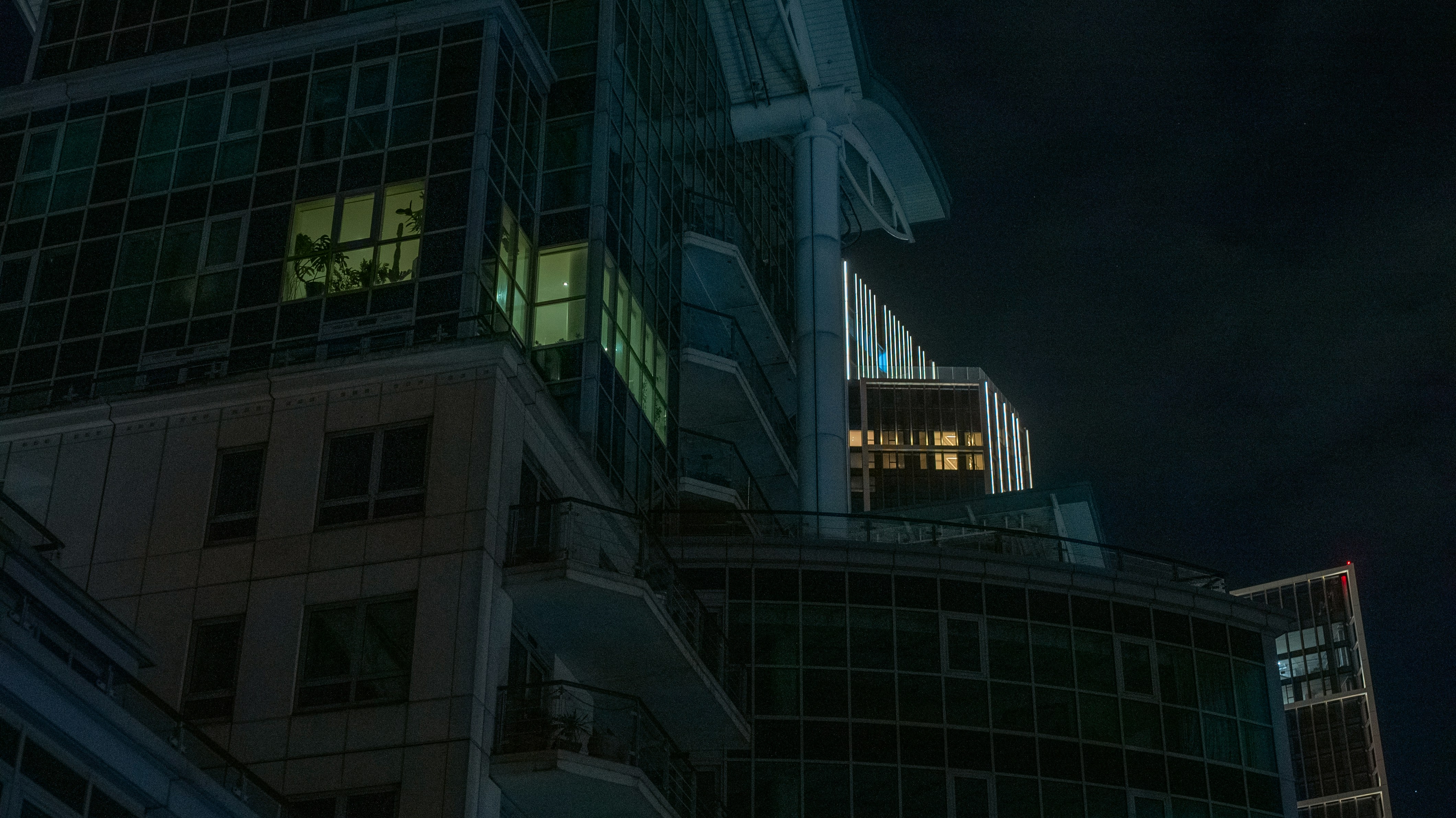 A tall building with a clock on the top of it
