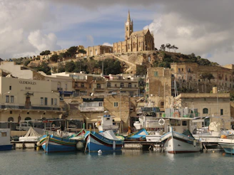 A bunch of boats that are sitting in the water