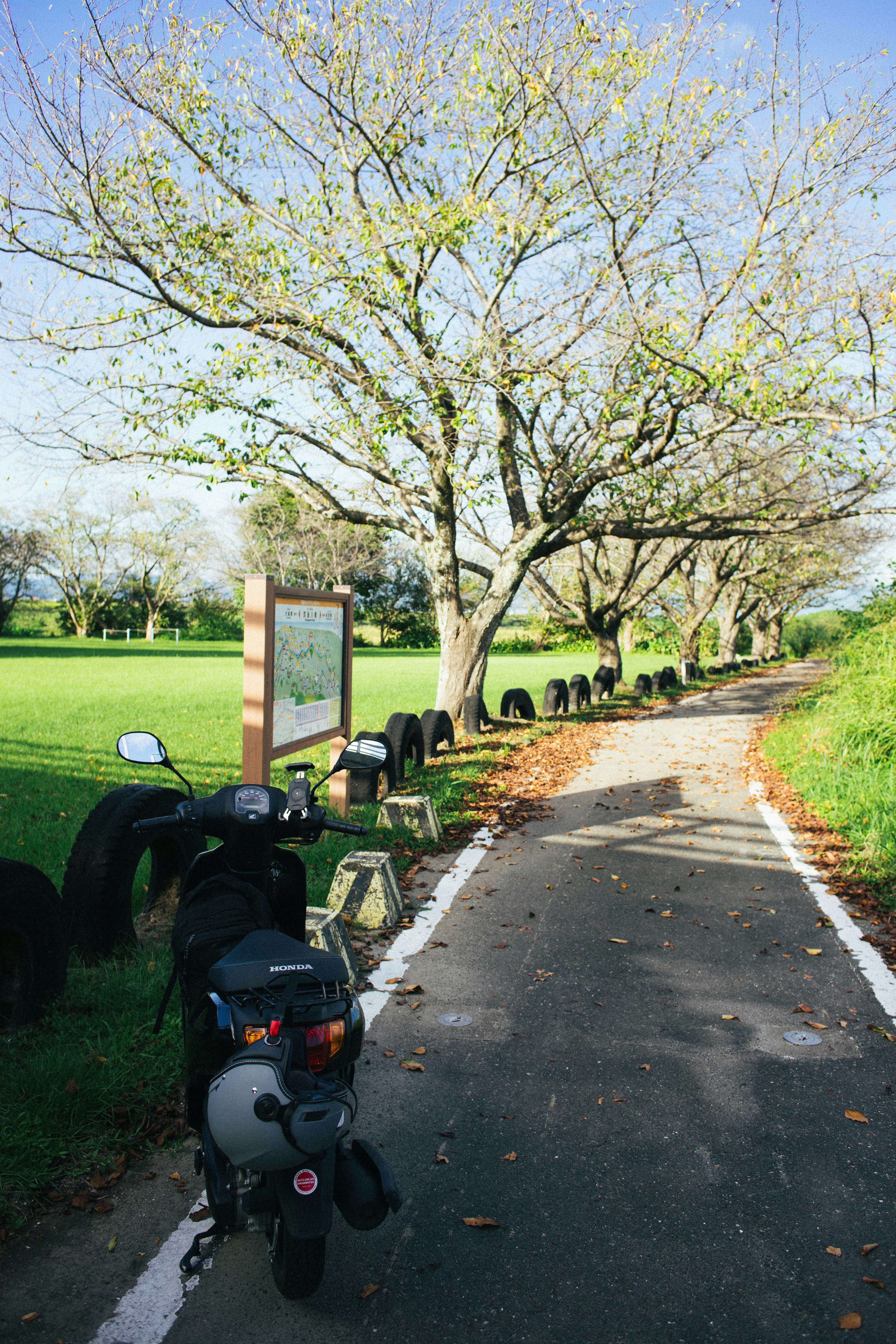 A motorcycle parked on the side of a road