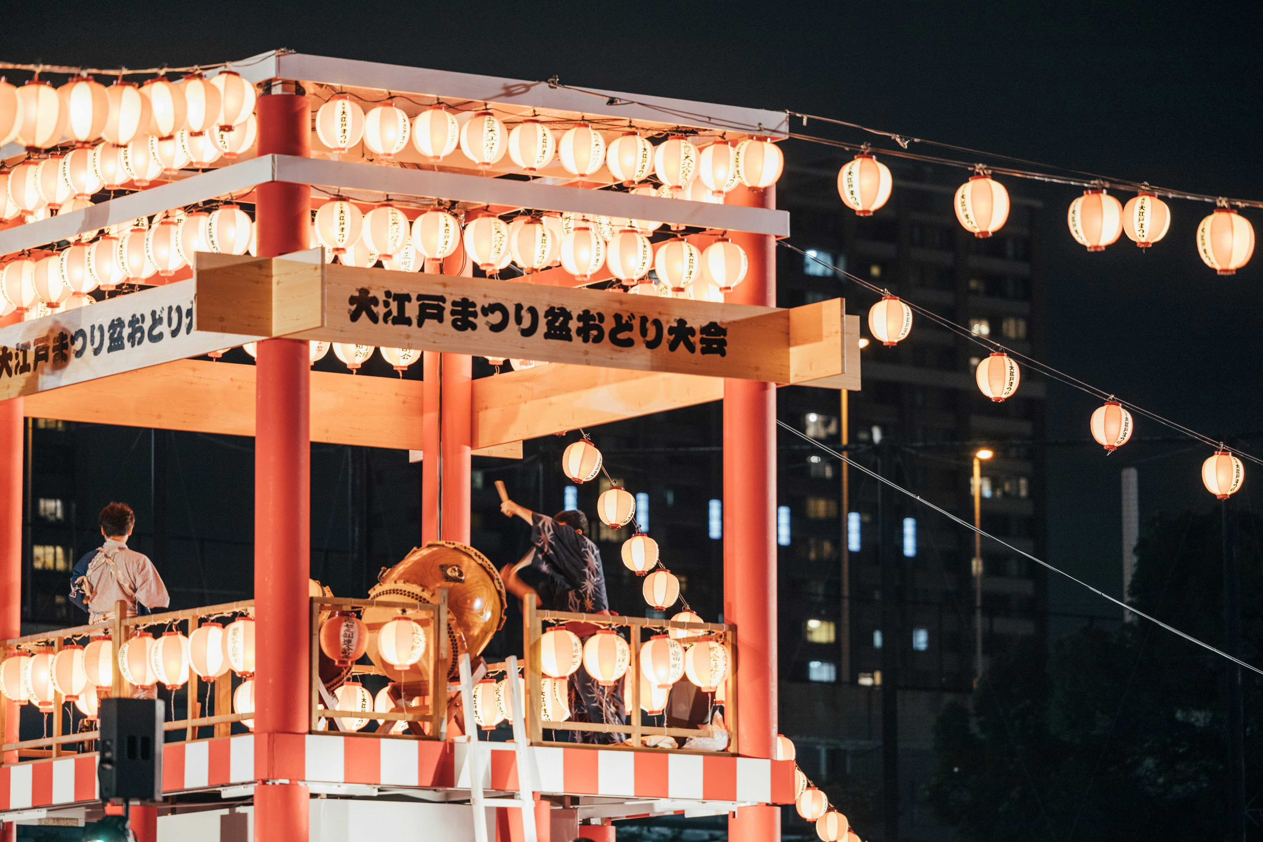 A merry go round is lit up at night