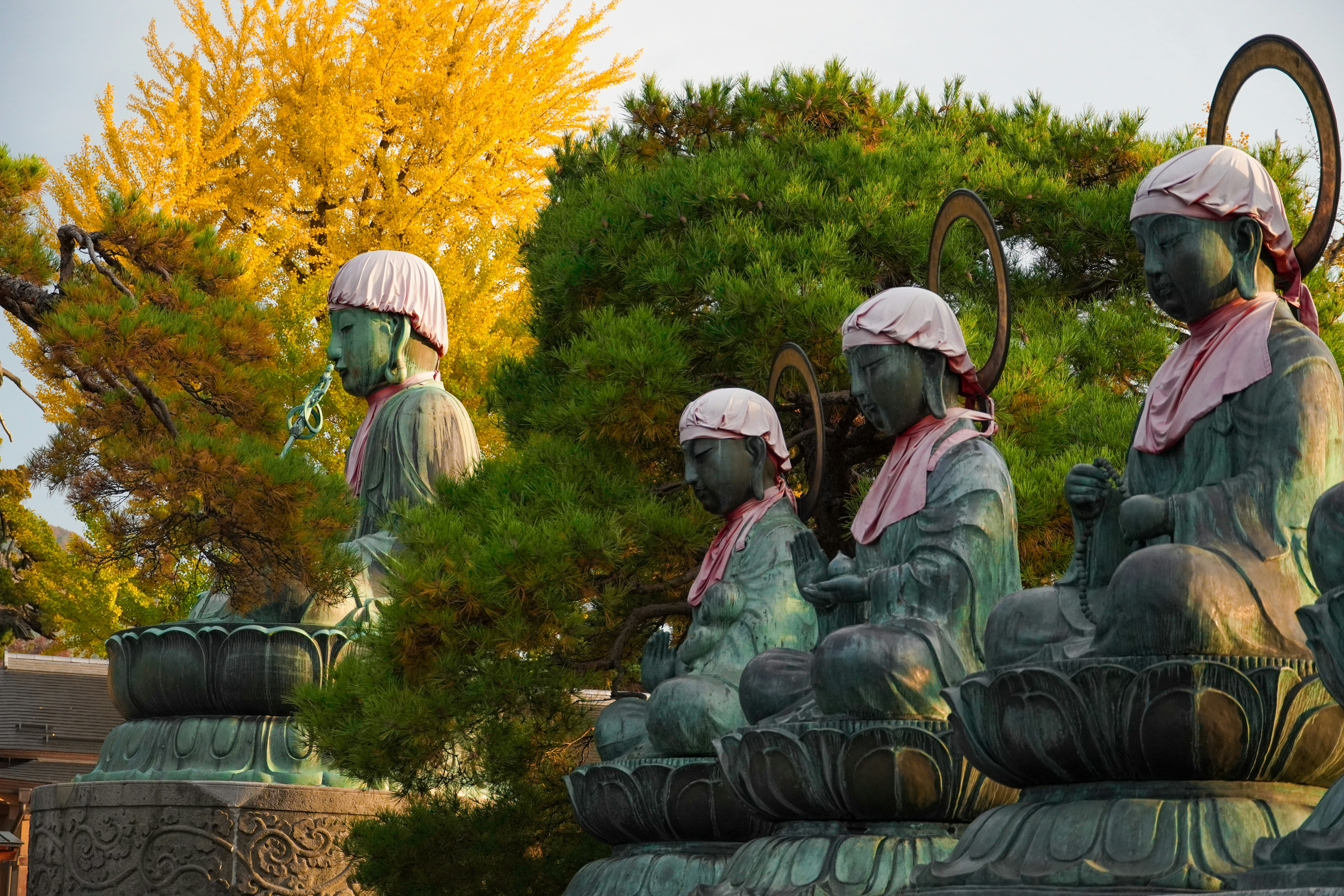 A group of statues sitting next to each other