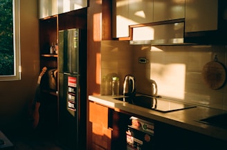 A kitchen with a window and a sink