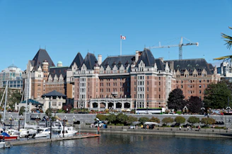 A large building sitting next to a body of water