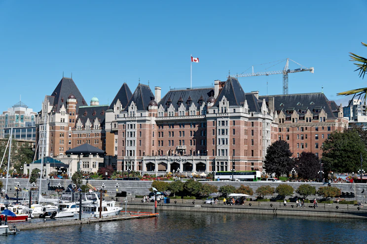 A large building sitting next to a body of water