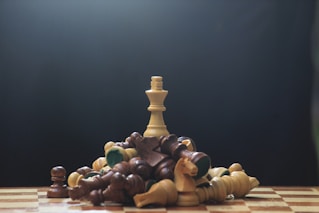 A chess board with pieces of chess on it