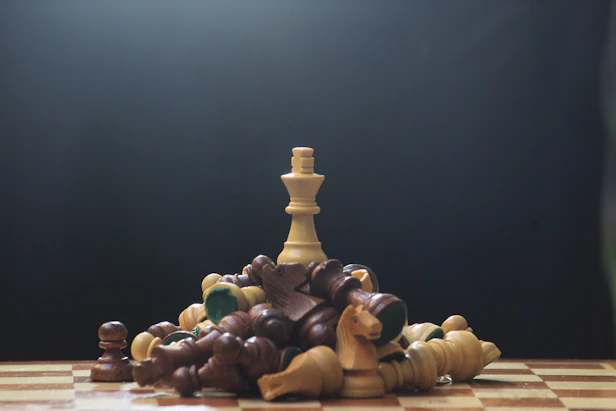 A chess board with pieces of chess on it