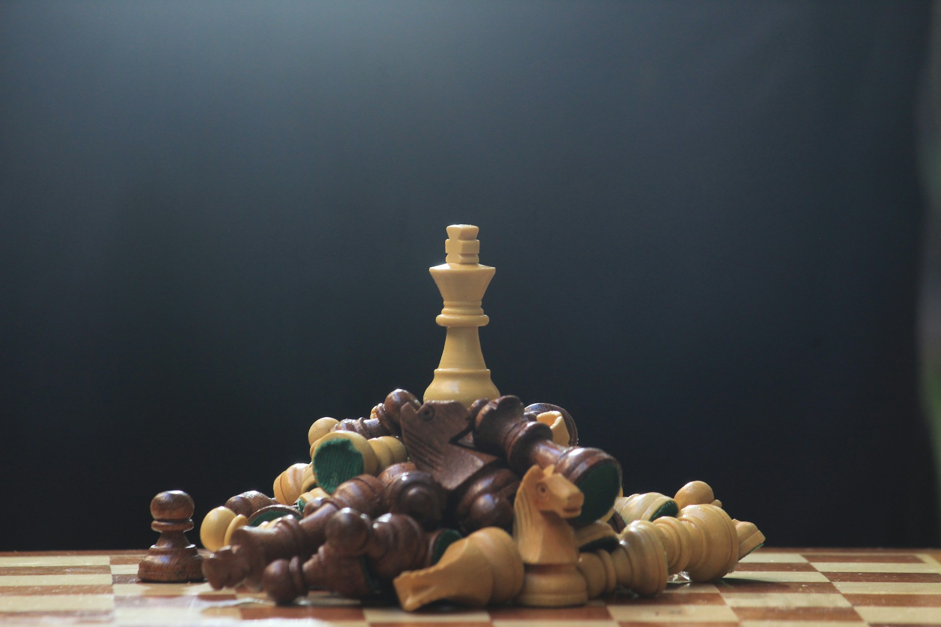 A chess board with pieces of chess on it