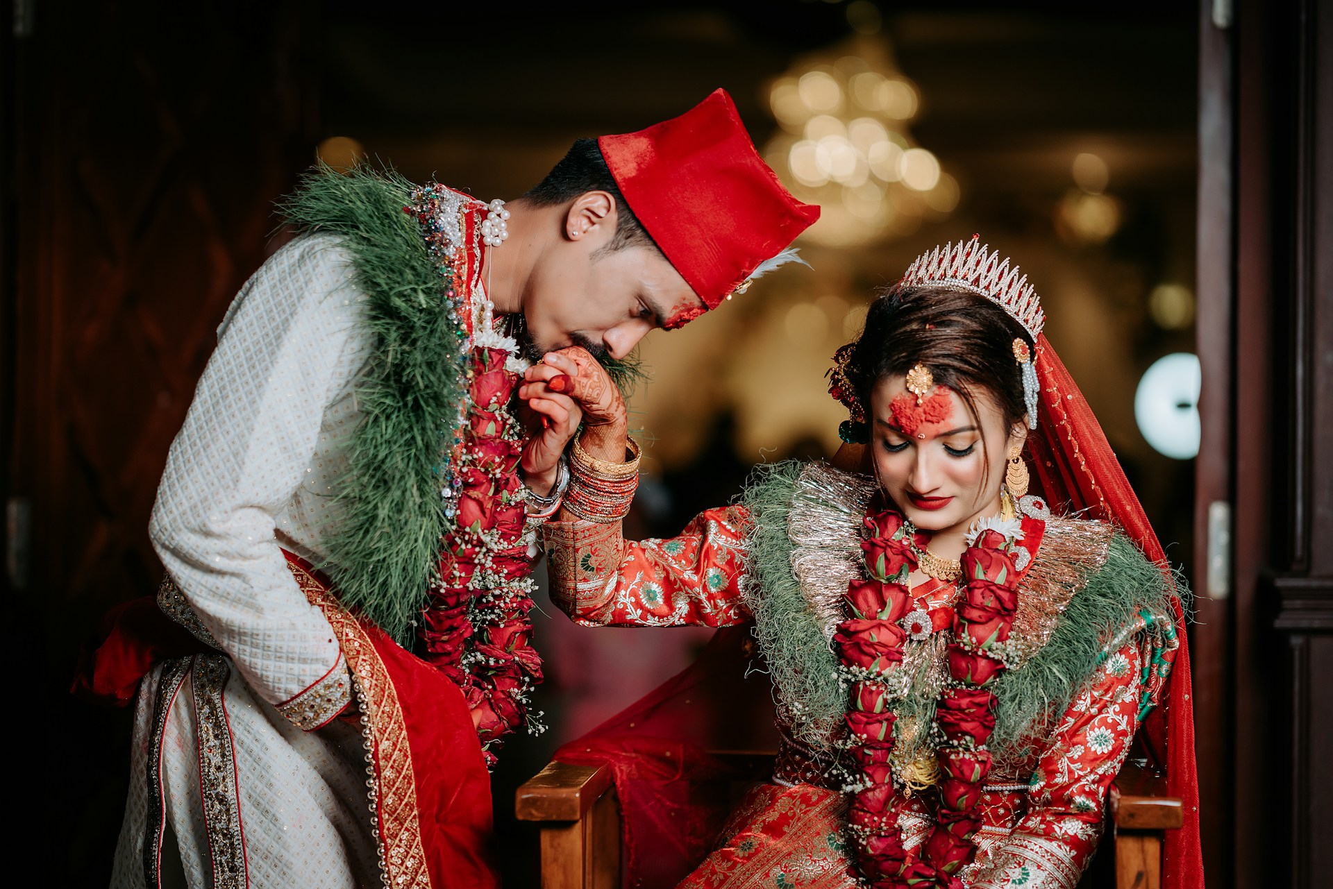 A man and woman dressed in traditional indian garb